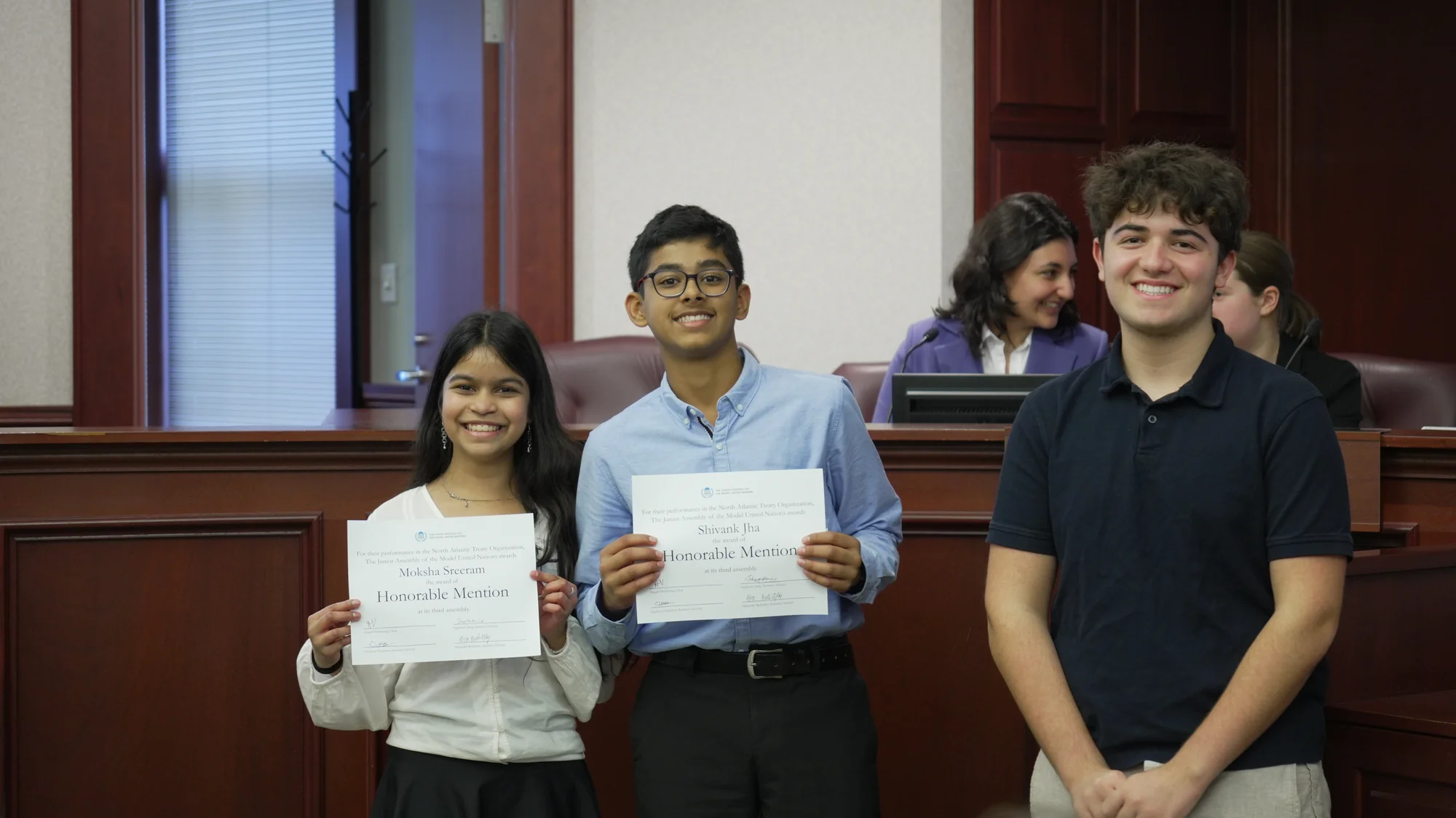 Students receiving JAMUN award recognition